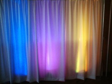 uplighting on whtie drape rental